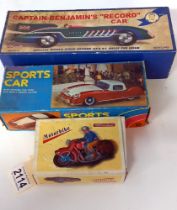 A boxed Schylling Captain Benjamins record car, Lucky sports car & a motorbike
