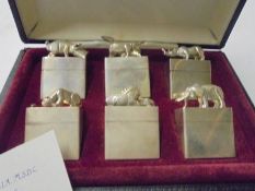 A cased set of six first limited edition pill boxes with individual animals on top by Derek T Birch,