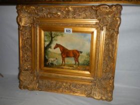 A heavy gilt framed oil on board painting of a horse with a dog, initialed TR/RT? 1907.49 x 43 cm,