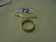 A 22ct gold wedding band, size L, 6.5 grams.