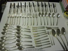Approximately 75 pieces of sterling silver flatware - 66 grams excluding dinner knives. 12 knives,