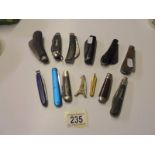 Approximately twelve vintage pen knives.