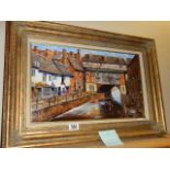 An oil on canvas Lincoln scene signed Gordon Lees, Frame 66 x 47 cm, image 49 x 29 cm. COLLECT ONLY.