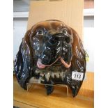 A Beswick dog head wall plaque, 28cm tall.