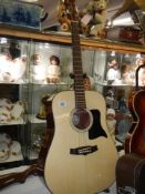 An as new Tanglewood TD-8 acoustic guitar with hard case, plays perfect.