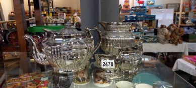 4 pieces of Ridgway silver lustre including teapot, cream jug, water jug and salt pot, circa 1820-