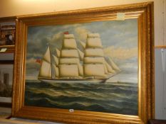A gilt framed oil on canvas painting of a tall ship, unsigned, Frame 142 x 112 cm, image 120 x 89 cm