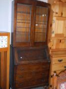 An oak bureau bookcase with lead glazed top, COLLECT ONLY.