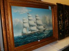 A gilt framed oil on canvas of a sailing ship, Frame 117 x 87 cm, image 90 x 59 cm, COLLECT ONLY.