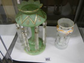 A green glass lustre and a small example.