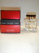A boxed Lalique perfume bottle.