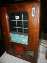 An old fairground noughts & crosses penny in the slot movement machine, COLLECT ONLY