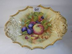 An Aynsley Orchard Gold scalloped gadroon rimmed bowl signed D Jones.