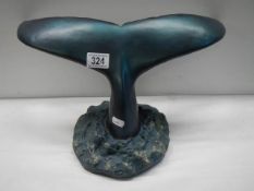 An Austin Productions sculpture of a whale tail.