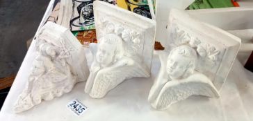 3 small plaster wall mounts with Cherub faces