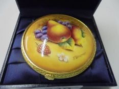 A boxed Royal Worcester porcelain trinket box.