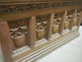 A large carved oak eccliastical sideboard. COLLECT ONLY.