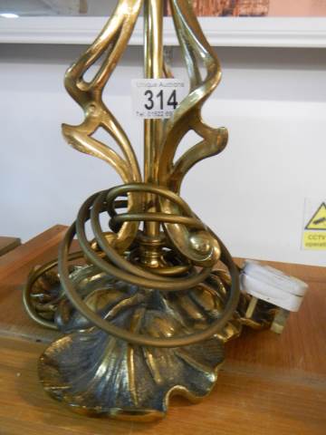 A mid 20th century cast brass table lamp base, 50 cm tall. - Image 2 of 2