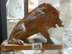 A mid 20th century carved wood boar.