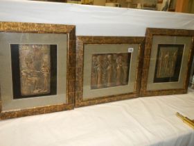 Three framed and glazed Egyptian style pictures.