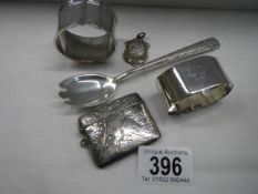 Five items of silver including vesta case, spoon etc.,