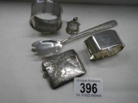 Five items of silver including vesta case, spoon etc.,