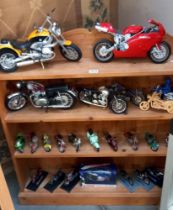 A large collection of die cast & plastic model motorcycles