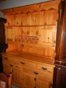 A good 20th century pine dresser. COLLECT ONLY.