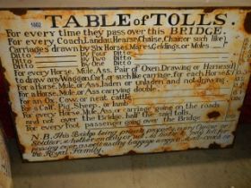 An enamel Table of Tolls sign, (90cm x 60cm) COLLECT ONLY.