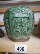 A green hexagonal Chinese ginger jar (missing lid).
