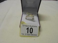 An 18ct gold two bar diamond designer ring, size K, 6.8 grams.