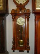 A Victorian mahogany double regulator wall clock in working order, COLLECT ONLY.