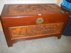 A Chinese carved camphor wood chest, COLLECT ONLY.