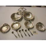 A quantity of silver plate 'Scallop' dishes and six salt spoons.