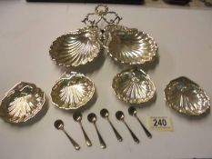 A quantity of silver plate 'Scallop' dishes and six salt spoons.