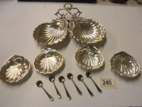 A quantity of silver plate 'Scallop' dishes and six salt spoons.