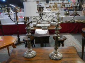 A pair of early Victorian Sheffield plate candelabra.