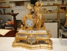 A good quality French gilded mantel clock, in working order. COLLECT ONLY