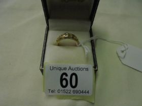 An 18ct gold MIZPAH ring, size N half, 3.9 grams.