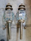 A pair of late 20th century brass carriage lamps.