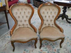 A pair of cabriole leg spoon back nursing chairs. COLLECT ONLY.