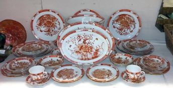In excess of 45 pieces of circa 1960's Japanese porcelain red & white design dinner ware, COLLECT