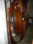 A Victorian mahogany framed oval mirror, COLLECT ONLY.