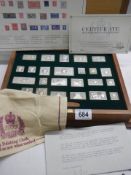 The Stamps of Royalty boxed silver set with book.