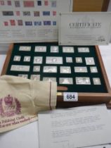 The Stamps of Royalty boxed silver set with book.