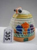 A Clarice Cliff conserve pot with lid, in good condition.