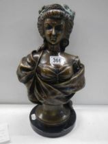 A Bronze female bust signed LeComte.