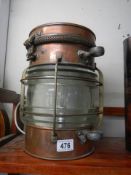 A good quality early 20th century copper ships lamp. Converted to electric