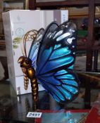 A Tiffany style glass butterfly lamp with box