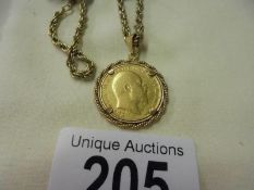 A 1907 Edward VII half sovereign in mount on a gold plated chain (marked 18K) total 14.55 grams.